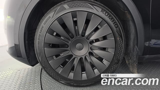 Tesla Model Y RWD — пробег 78 141 км — фото 5 из 5