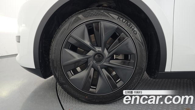Tesla Model Y RWD — пробег 22 774 км — фото 5 из 5