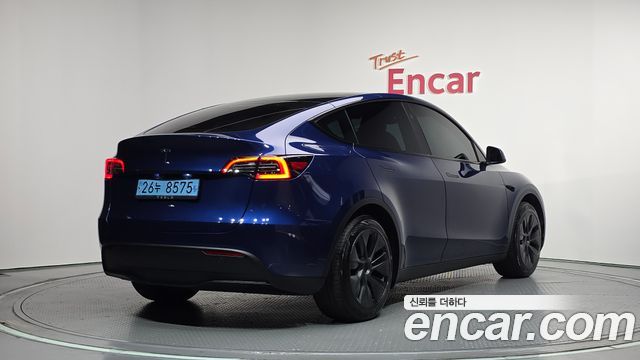 Tesla Model Y RWD — пробег 35 555 км — фото 2 из 5