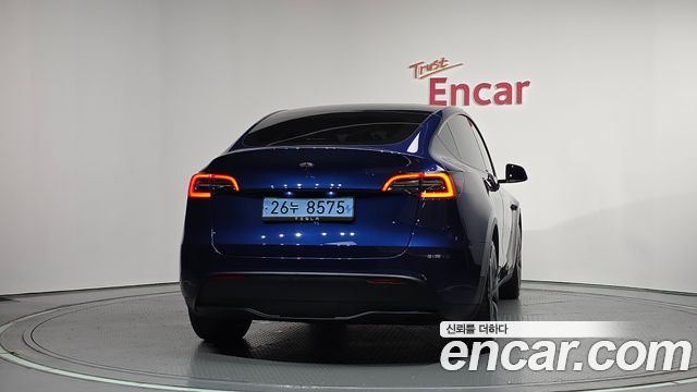 Tesla Model Y RWD — пробег 35 555 км — фото 4 из 5